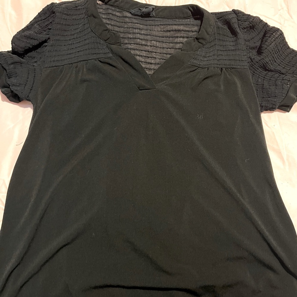 Short sleeve black t shirt, light see through design on back, size small